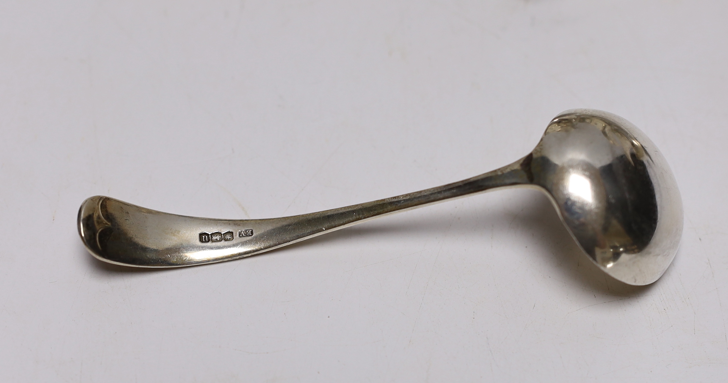 A set of three George VI silver sauceboats, Viners Ltd, Sheffield, 1937, together with three ladles (two silver) and one other silver sauceboat, 16.1oz.